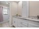 Bathroom with double vanity, granite countertops, and a shower/tub combo at 2139 Abby Ave, Spring Hill, FL 34609