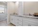 Updated bathroom with white cabinets, granite countertops, and marble shower at 2139 Abby Ave, Spring Hill, FL 34609