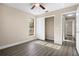 Bedroom with large closet and ceiling fan at 2139 Abby Ave, Spring Hill, FL 34609