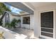 Front entrance with covered patio at 2139 Abby Ave, Spring Hill, FL 34609
