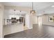 Open kitchen with granite countertops, stainless steel appliances, and a breakfast bar at 2139 Abby Ave, Spring Hill, FL 34609