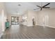 Spacious living area with high ceilings and wood-look flooring at 2139 Abby Ave, Spring Hill, FL 34609
