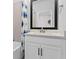 Clean bathroom with single vanity and tub shower combo at 2511 N Grady Ave # 26, Tampa, FL 33607