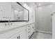 Modern bathroom with double vanity and walk-in shower at 2511 N Grady Ave # 26, Tampa, FL 33607