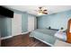 Comfortable bedroom with wood floors, ceiling fan and ample closet space at 2601 Bay Blvd, Indian Rocks Beach, FL 33785
