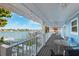 Waterfront deck with outdoor seating and water views at 2601 Bay Blvd, Indian Rocks Beach, FL 33785