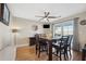 Elegant dining room with hardwood floors and access to a waterfront view at 2601 Bay Blvd, Indian Rocks Beach, FL 33785