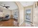 Bright entryway with hardwood floors and access to the front porch at 2601 Bay Blvd, Indian Rocks Beach, FL 33785