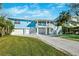 Two-story waterfront home with double garage and balcony at 2601 Bay Blvd, Indian Rocks Beach, FL 33785