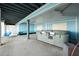 Covered patio with hot tub and comfortable seating area at 2601 Bay Blvd, Indian Rocks Beach, FL 33785