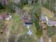 Aerial view showing house, yard, and neighboring properties at 34027 Saint Joe Rd, Dade City, FL 33525