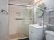 Clean bathroom with a shower/tub combo and vanity at 34027 Saint Joe Rd, Dade City, FL 33525