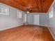 Spacious bonus room with wood ceiling and access to deck at 34027 Saint Joe Rd, Dade City, FL 33525