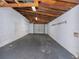 Spacious garage with overhead storage and an additional room at 34027 Saint Joe Rd, Dade City, FL 33525