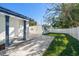 Backyard view showing home's entrance and detached garage at 7516 38Th N Ave, St Petersburg, FL 33710