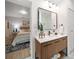 Bathroom boasts a modern vanity and a view of the bedroom at 7516 38Th N Ave, St Petersburg, FL 33710