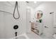 Clean bathroom featuring white subway tile and a black showerhead at 7516 38Th N Ave, St Petersburg, FL 33710