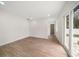 Spacious bedroom with wood-look floors and sliding glass doors at 7516 38Th N Ave, St Petersburg, FL 33710