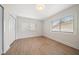 Bright bedroom with hardwood floors and two windows with blinds at 7516 38Th N Ave, St Petersburg, FL 33710