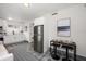 Modern kitchen with white cabinets and stainless steel appliances at 7516 38Th N Ave, St Petersburg, FL 33710
