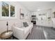 Open concept kitchen and living area with white cabinets at 7516 38Th N Ave, St Petersburg, FL 33710