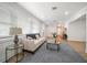Living room features a comfy sofa and a large window with blinds at 7516 38Th N Ave, St Petersburg, FL 33710
