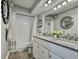 Bathroom with granite countertops and double sinks at 8651 10Th N St # 130, St Petersburg, FL 33702