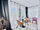 Modern dining area with two red and brown chairs at 8651 10Th N St # 130, St Petersburg, FL 33702