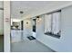 Condo building exterior showing walkway and unit entrance at 8651 10Th N St # 130, St Petersburg, FL 33702