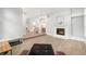 Open living space with hardwood floors and a stunning fireplace at 8703 Cypress Mill Ct, Tampa, FL 33647