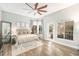Bright and airy main bedroom with king-size bed and backyard access at 8703 Cypress Mill Ct, Tampa, FL 33647