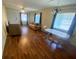 Dining area with laminate flooring and small table at 889 Sky Loch S Dr, Dunedin, FL 34698