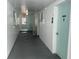 Shared hallway with access to building amenities at 889 Sky Loch S Dr, Dunedin, FL 34698