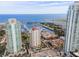 Aerial view of high rise building with pool and marina at 100 Beach Ne Dr # 1501, St Petersburg, FL 33701