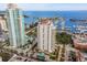 Aerial view of high rise building with pool and marina at 100 Beach Ne Dr # 1501, St Petersburg, FL 33701