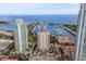 Aerial view of high rise building with pool and marina at 100 Beach Ne Dr # 1501, St Petersburg, FL 33701