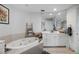 Elegant bathroom with a large bathtub and double vanity at 100 Beach Ne Dr # 1501, St Petersburg, FL 33701