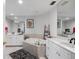 Elegant bathroom with double vanity and soaking tub at 100 Beach Ne Dr # 1501, St Petersburg, FL 33701