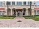 100 Beach Drive building entrance with landscaping at 100 Beach Ne Dr # 1501, St Petersburg, FL 33701