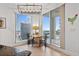 Bright dining area with city views and balcony access at 100 Beach Ne Dr # 1501, St Petersburg, FL 33701