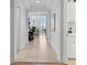 Light-filled hallway leading to living area at 100 Beach Ne Dr # 1501, St Petersburg, FL 33701