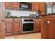 Built-in oven and microwave in the kitchen at 100 Beach Ne Dr # 1501, St Petersburg, FL 33701
