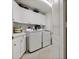 Convenient laundry room with washer and dryer at 100 Beach Ne Dr # 1501, St Petersburg, FL 33701