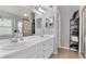 Bathroom features double vanity and a walk-in shower at 10618 Foxcrest Way, Riverview, FL 33569