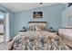 Main bedroom with sliding doors leading to backyard at 10618 Foxcrest Way, Riverview, FL 33569