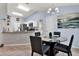 Kitchen with granite countertops, stainless steel appliances and breakfast nook at 10618 Foxcrest Way, Riverview, FL 33569