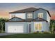 Two-story home with blue and white siding, brown roof, and a two-car garage at 12652 Glenn Creek Dr, Riverview, FL 33569