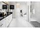 Bright and spacious bathroom with a large vanity, soaking tub, and walk-in shower at 14638 Swiss Bridge Dr, Lithia, FL 33547