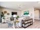 Spacious living room with light-colored furniture and large windows at 14814 Paddock Pond Ave, Lithia, FL 33547