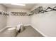 Spacious walk-in closet with ample shelving and hanging space at 14814 Paddock Pond Ave, Lithia, FL 33547